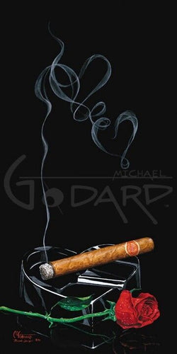 Cigar sitting in heart shaped glass ashtray with smoke going up forming a heart. A read rose sits in front of the ashtray.